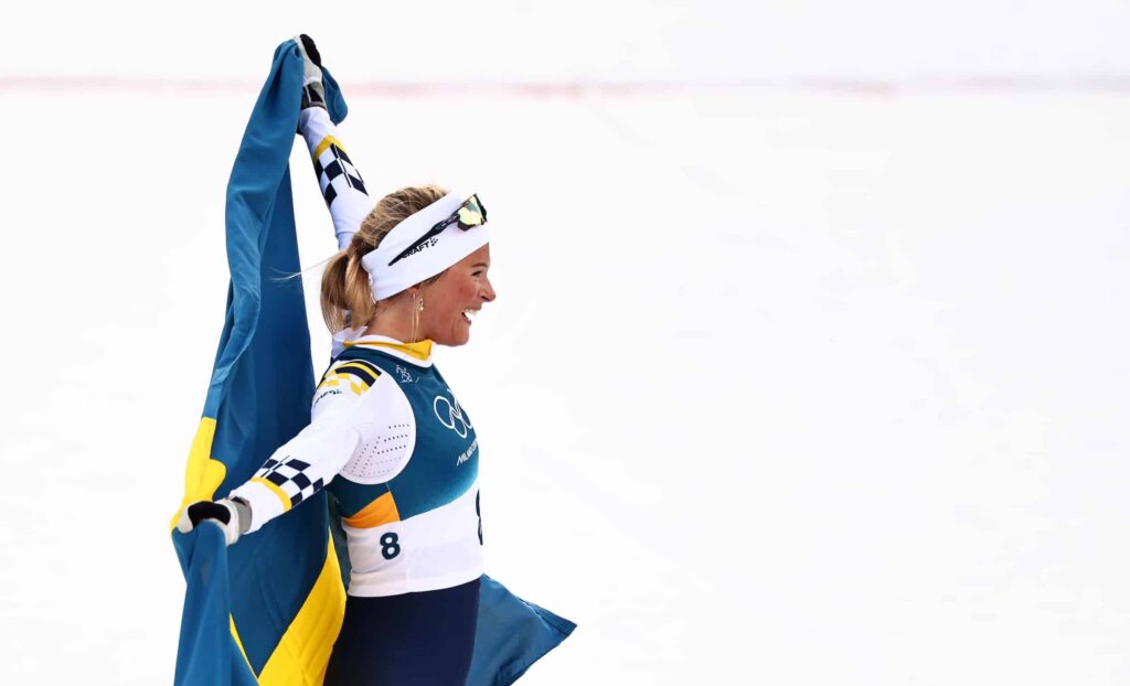 Kuva julki: Frida Karlsson juhli olympiakultaa hiihtomiehen seurassa